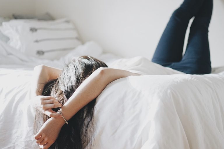 girl relaxing in bed