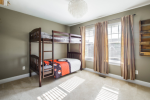 a bedroom with shutters installed