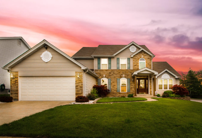 a big house with a garage